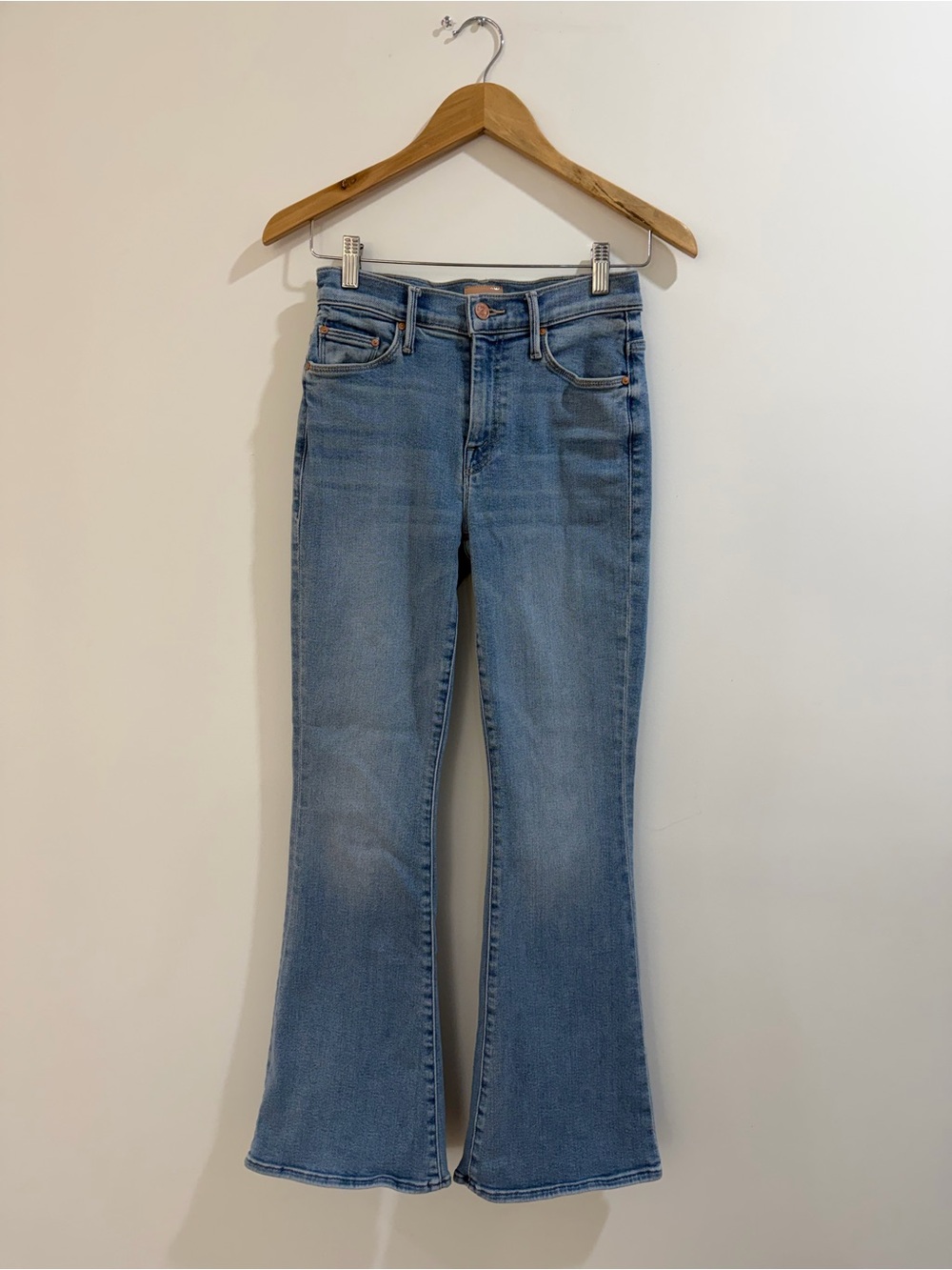 MOTHER The Weekender Light Wash Flared Jeans in Pale Blue